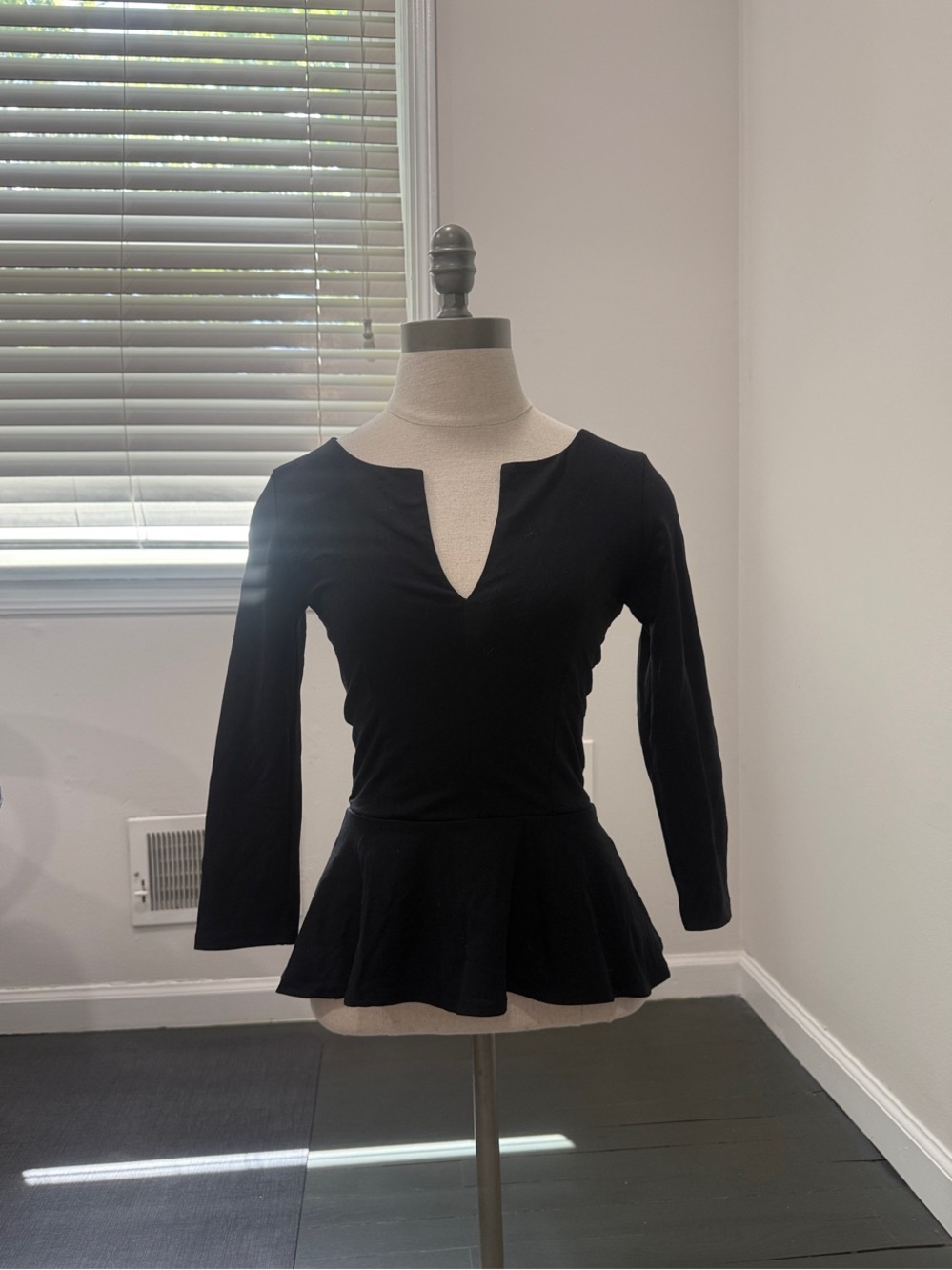 bebe Black Peplum V-Notch Long Sleeve Top